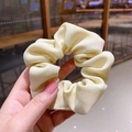 Beige ribbed fabric scrunchie elastic hair tie for elegant high ponytail styling - Twill Milk Yellow