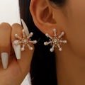 Golden snowflake stud earrings with sparkling rhinestones and white pearls - Gold Pearl Snowflake Stud Earrings Style (M-394)