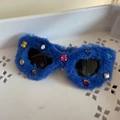 Detailed shot of blue plush frames with colorful rhinestones and dark lenses sunglasses - Sapphire Blue