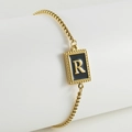 Chic 18k gold plated stainless steel bracelet with letter R pendant and textured border - R-Black