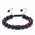 Detailed macro view of adjustable Aries zodiac bracelet with 10mm black beads - Aries