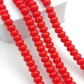 Macro detail of red abacus glass beads arranged on a white display for DIY jewelry - 5*8mm Approx 75pcs per strand / Porcelain Red