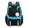 Detail of black backpack with blue trim featuring USB port and pink plush pompom charm - Sky Blue
