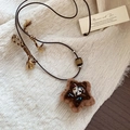 Detailed close-up of handmade star plush pendant with wooden beads and tiger eye stone - #38 Necklace - Brown - Star