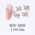 Détail des bijoux d'ongles papillon 3D Aurora AB en alliage et cristaux 11x8,5mm - Papillon Ajouré Aurora AB Base Argent (AM36)