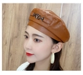 Classic caramel brown leather beret with a stylish metal V buckle and side profile view - One Size 58cm / Coffee V Logo Style