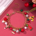 Detail of Christmas bracelet with Santa, bell and pearl charms on red background - D1144 (Colorful Christmas Pendants)