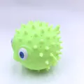 Light green puffer fish squeeze toy with soft spikes for kids bath and stress relief - Green Bath Dolphin