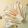 14-piece white silicone kitchen utensil set with wooden handles in matching storage bucket - Kitchen Utensil Set With Spoon Rest And Egg Separator / Off White
