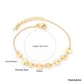 Detail view of gold plated stainless steel bracelet with 6mm circular pendants and lobster clasp - Gold Minimalist Thick Disc Bracelet