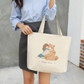 Off-white canvas tote bag featuring a cute girl hugging a bear cartoon illustration - White Girl and Bear