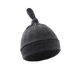 Detail of a dark gray knitted newborn baby hat with a stylish top knot design - Black and Gray