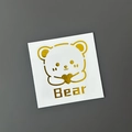 Cartoon bear and heart gold foil sticker with Bear text on white square backing - Gold (Heart Bear)