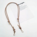 Detail view of beige leather shoulder strap with gold lobster clasps and decorative knots - Gold Plate Hook / Khaki