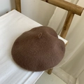 Classic brown wool beret hat in soft fabric displayed on a minimalist bamboo chair - M(56-58cm) / Dark Coffee
