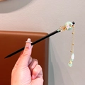 Elegant sandalwood hair stick with pink flower, gold accents and green jade tassels - Butterfly Orchid Wood