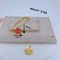 Vergoldete Halskette mit orangefarbenem Emaille-Schlangenanhänger und 23mm x 17mm Maßen - Orangefarbene Schlange Rund