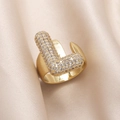 Gold plated open ring featuring a sparkling zircon-paved letter J on beige silk - Small / Letter J
