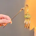 Traditional Chinese gold palace lantern hair stick with pearls and metal tassels - Round Lantern Hairpin (Gold)