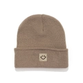 Detail of a brown knitted beanie with a square smiley face patch on the folded brim - Khaki