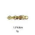 Pinza para el pelo de mariposa dorada con tres lazos, mide 1.5x6.8cm y pesa unos 7g - Lazo Dorado