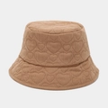 Detail view of camel bucket hat featuring elegant heart-shaped quilted pattern and texture - M (56-58cm) / Tan