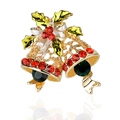 Christmas brooch featuring double gold bells with red rhinestones and green holly leaves - Golden Bell