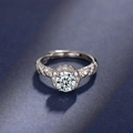 Silver adjustable moissanite ring with halo setting and pavé crystals on a blue surface - 6.5mm [1 Carat] Precision Ljz-04 / Adjustable Open