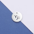 Detailed view of silver titanium steel Capricorn zodiac pendant with hollow geometric design - Capricorn