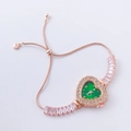 Detailed view of rose gold bracelet watch with green heart dial and zircon embellishments - Rose Gold-Heart Green Dial (GADI)