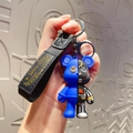 Portachiavi orso meccanico in blu e nero con cinturino in nylon nero intrecciato - Blu