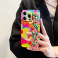 Detail of iPhone case with floral pattern and braided lanyard in pink and green - Sj1 [imd Glossy] Rainbow Braided Wristband / iPhone 14