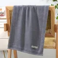 Gray pure cotton face towel with SLOW LIFE label and textured striped border - Plain Stripe - Grey Blue
