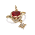 Macro detail of golden Saturn heart pendant with red stone and dangling crystal star - Red Heart Planet