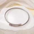 Bracciale rigido a cavo ritorto argento con estremità sferiche su base in pietra - Argento