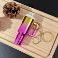 Mini yellow and pink gradient tumbler keychain on a wooden tray with a pinecone accent - Gradient Gold Rose