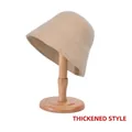 Thick knitted bucket hat in light khaki oatmeal color on a wooden hat stand - Thickened / Thickened Khaki