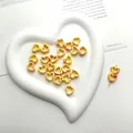DIY heart-shaped ceramic beads in yellow and red ink wash finish for jewelry making - Red & Yellow Inkwash