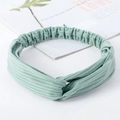 Elastic light green twisted knot headband with ribbed knit texture for yoga and daily wear - Knitted Fruit Green