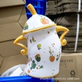 Creative ceramic canister with attitude, featuring colorful abstract fruit spots and lid - New Yellow