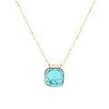 Detailed macro view of square turquoise pendant with natural black veins on gold chain - Square Stone Necklace
