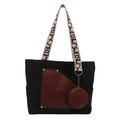 Large black canvas tote bag with reddish brown leather pocket and round coin purse charm - Black