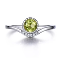925 sterling silver ring featuring a round peridot green gemstone and micro-pave crystals - US 7 / Olive Green