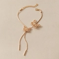 Elegant gold butterfly chain bracelet featuring lobster clasp and adjustable extension chain - Hollow Butterfly Tassel Bracelet / KC Gold (Tassel)