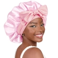 Pink satin hair bonnet featuring a large decorative bow for night hair protection - Large / Light Pink