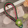 Pink and green braided phone lanyard with a white crochet flower and green metal ring - Green Pink Contrast/Green Flower