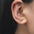 Golden crawler earrings with four gradient round cubic zirconia stones for women - Graduated Stones Style (DZ-645)