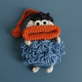 Handmade crochet key case featuring a funny big mouth and blue spiral body texture - Dark Blue Curly Hair Style