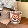 Off-white canvas bucket bag with cute cartoon bear print and brown carrying straps - Chocolate Bear