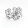 Detailed view of silver titanium steel open ring with continuous spiral pattern design - Spiral Belt Pattern (R6066)